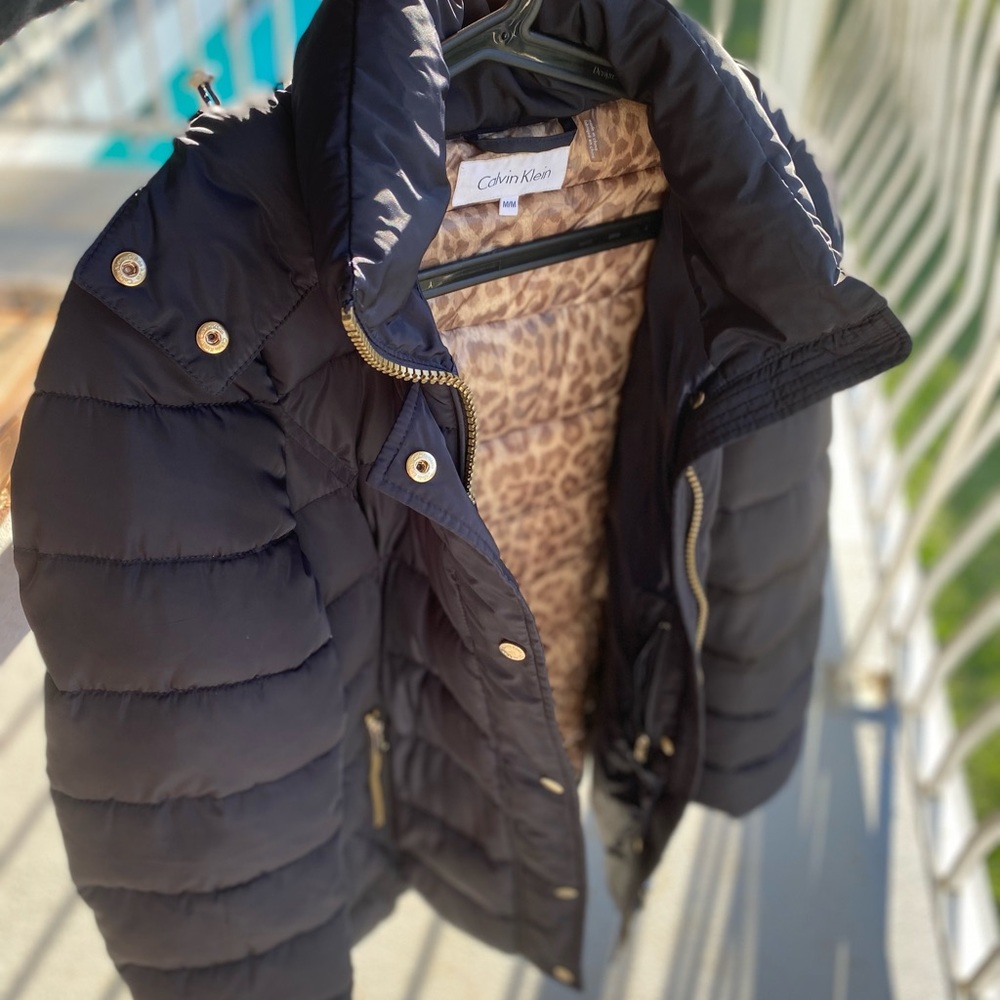 Calvin Klein super warm puffy coat with hood.